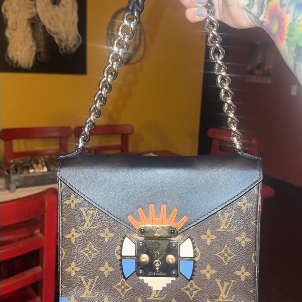 Louis Vuitton Brown & Black Monogram Crossbody with stunning tribal mask Clasp